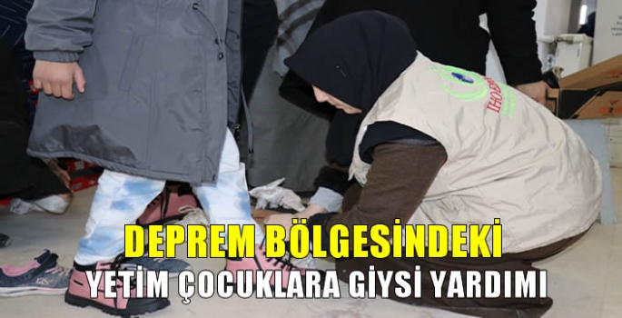 Deprem bölgesindeki yetim çocuklara giysi yardımı