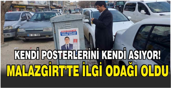 Kendi posterlerini kendi asıyor! Malazgirt’te ilgi odağı oldu