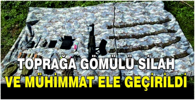 Toprağa gömülü silah ve mühimmat ele geçirildi