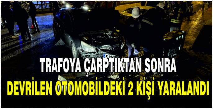 Trafoya çarptıktan sonra devrilen otomobildeki 2 kişi yaralandı