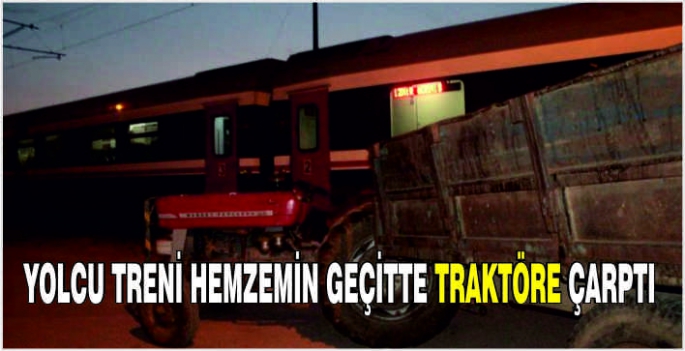 Yolcu treni hemzemin geçitte traktöre çarptı